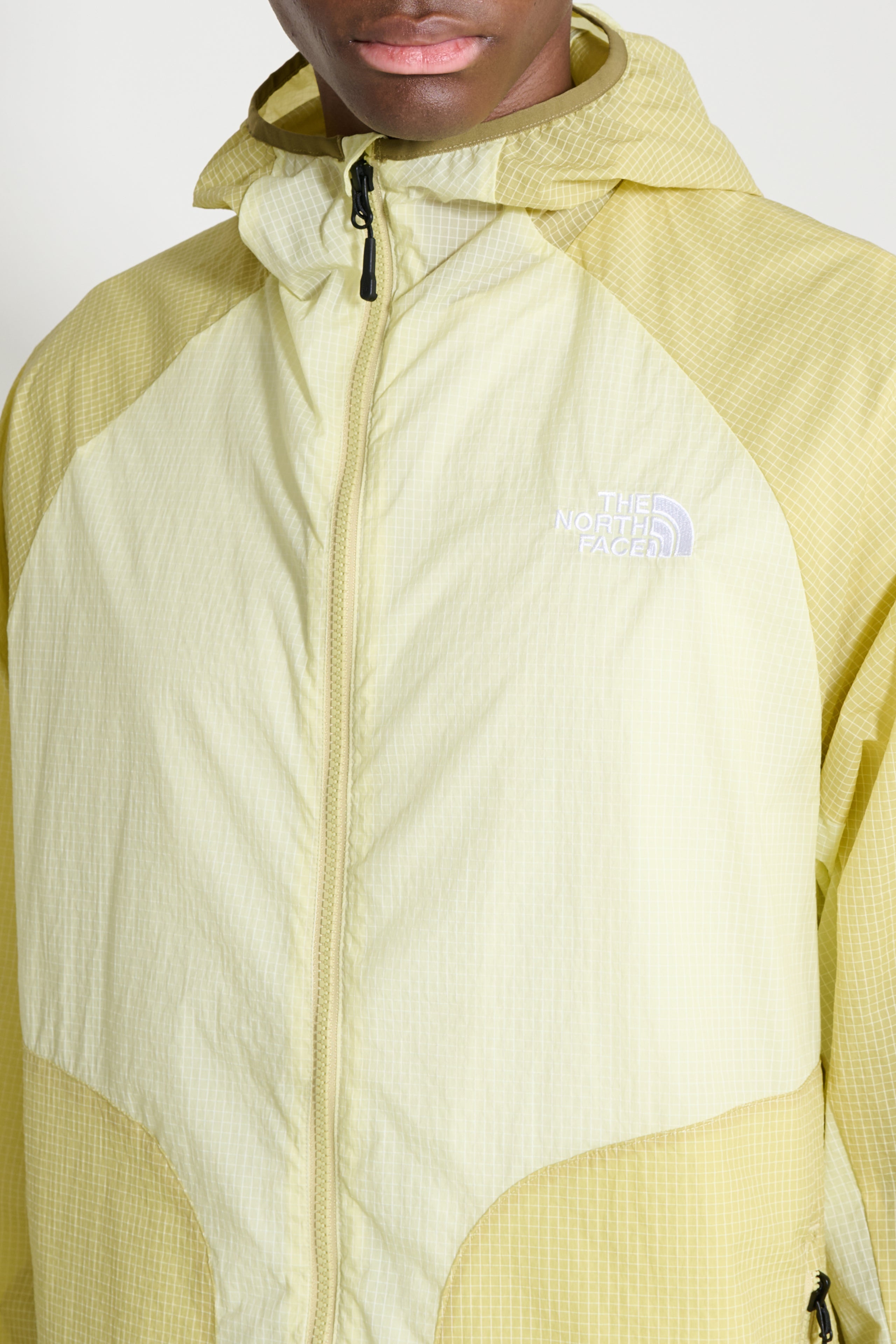 The North Face U NSE Wind Jacket Lemon Mist / Pear