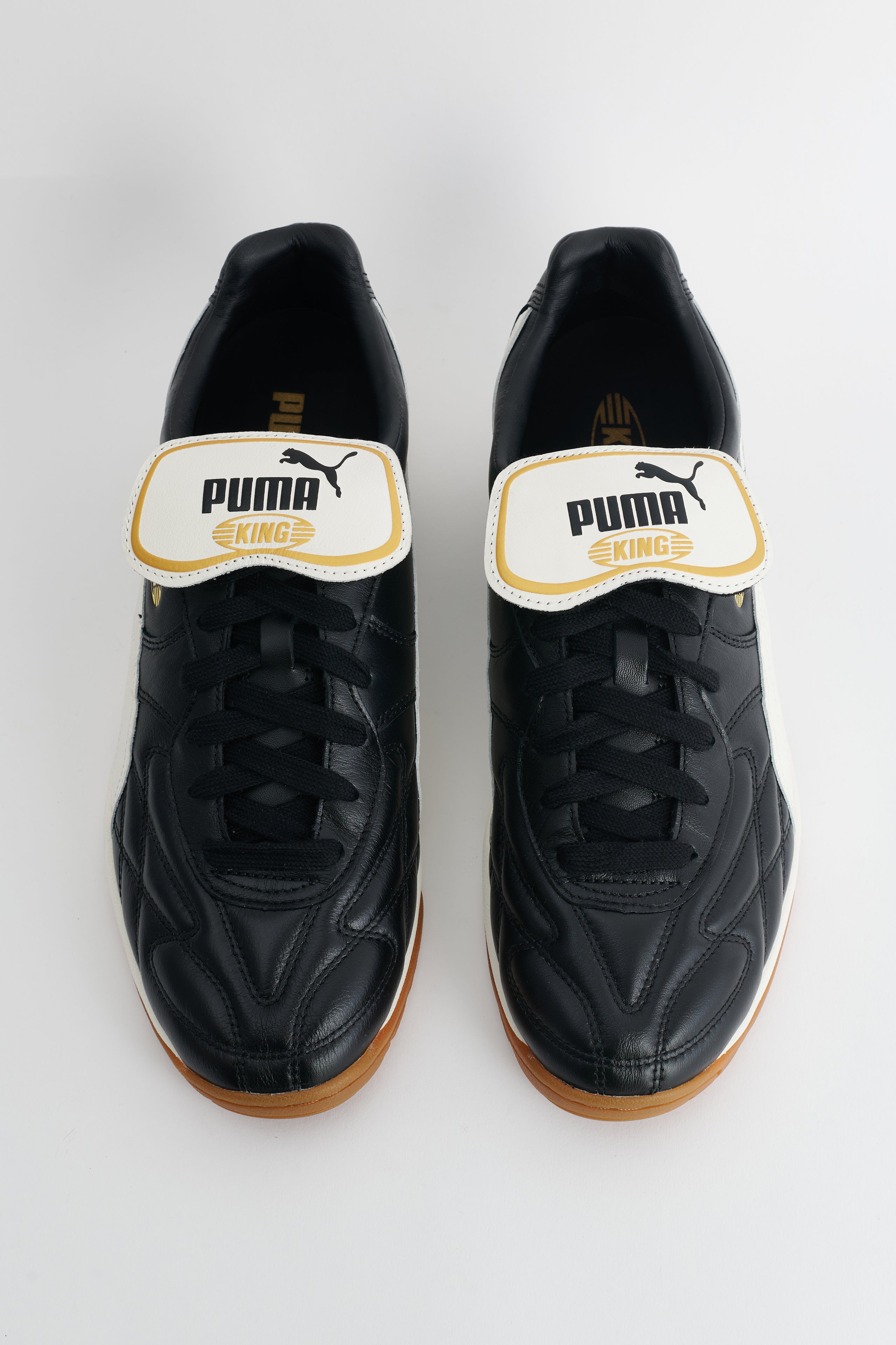 PUMA King Indoor Puma Black / Warm White