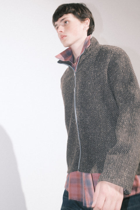Person wearing Our Legacy Shrunken Fullzip Polo and Borrowed Shirt Idaho Flannel