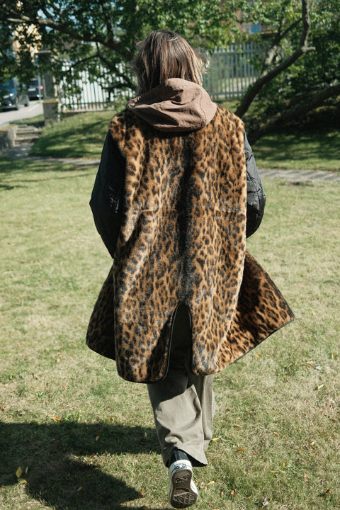 Person wearing Stüssy All Seasons Trench Black