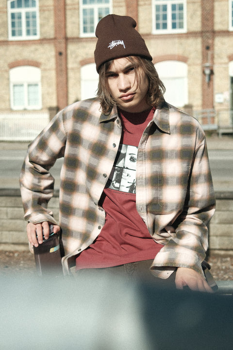 Person wearing Stüssy June Plaid Shirt Rose.
