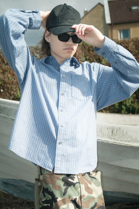 Person wearing Stüssy Oxford LS Shirt Blue Stripe