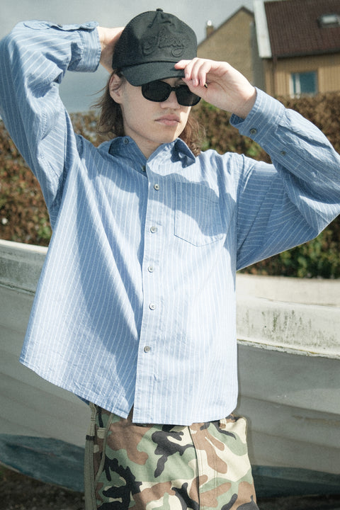 Person wearing Stüssy Oxford LS Shirt Blue Stripe