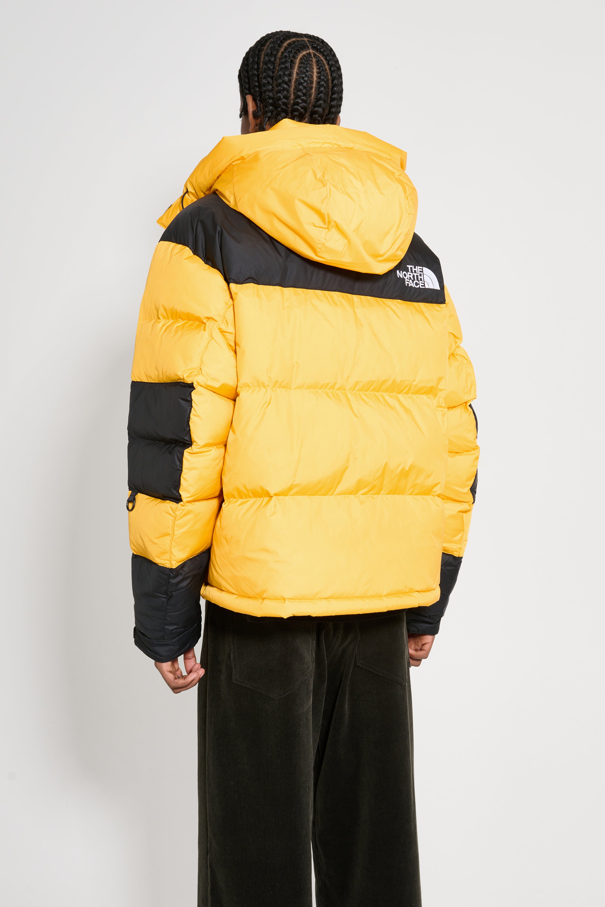 The North Face Himalayan Baltoro Jacket Summit Gold / TNF Black