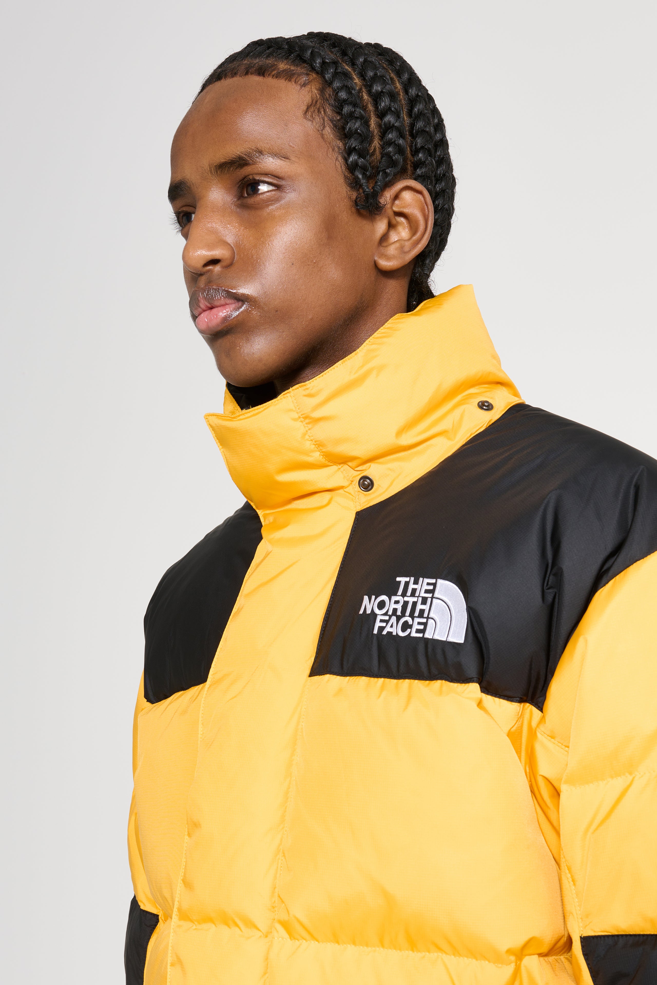 The North Face Himalayan Baltoro Jacket Summit Gold / TNF Black