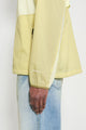The North Face U NSE Wind Jacket Lemon Mist / Pear