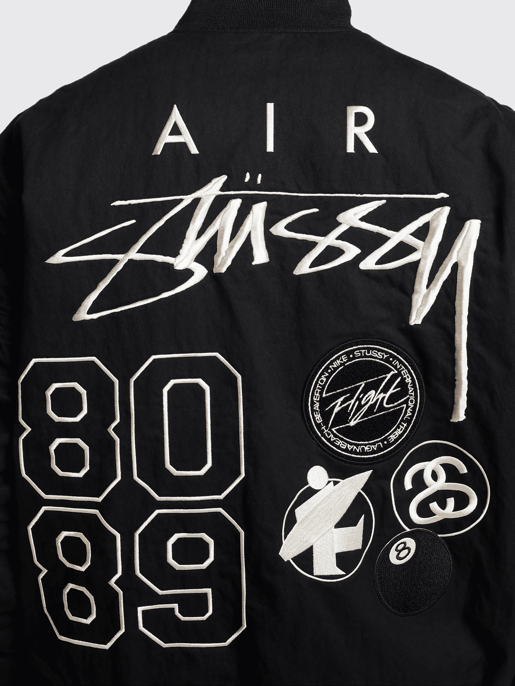 Nike x Stüssy Reversible Flight Jacket Black / Sail