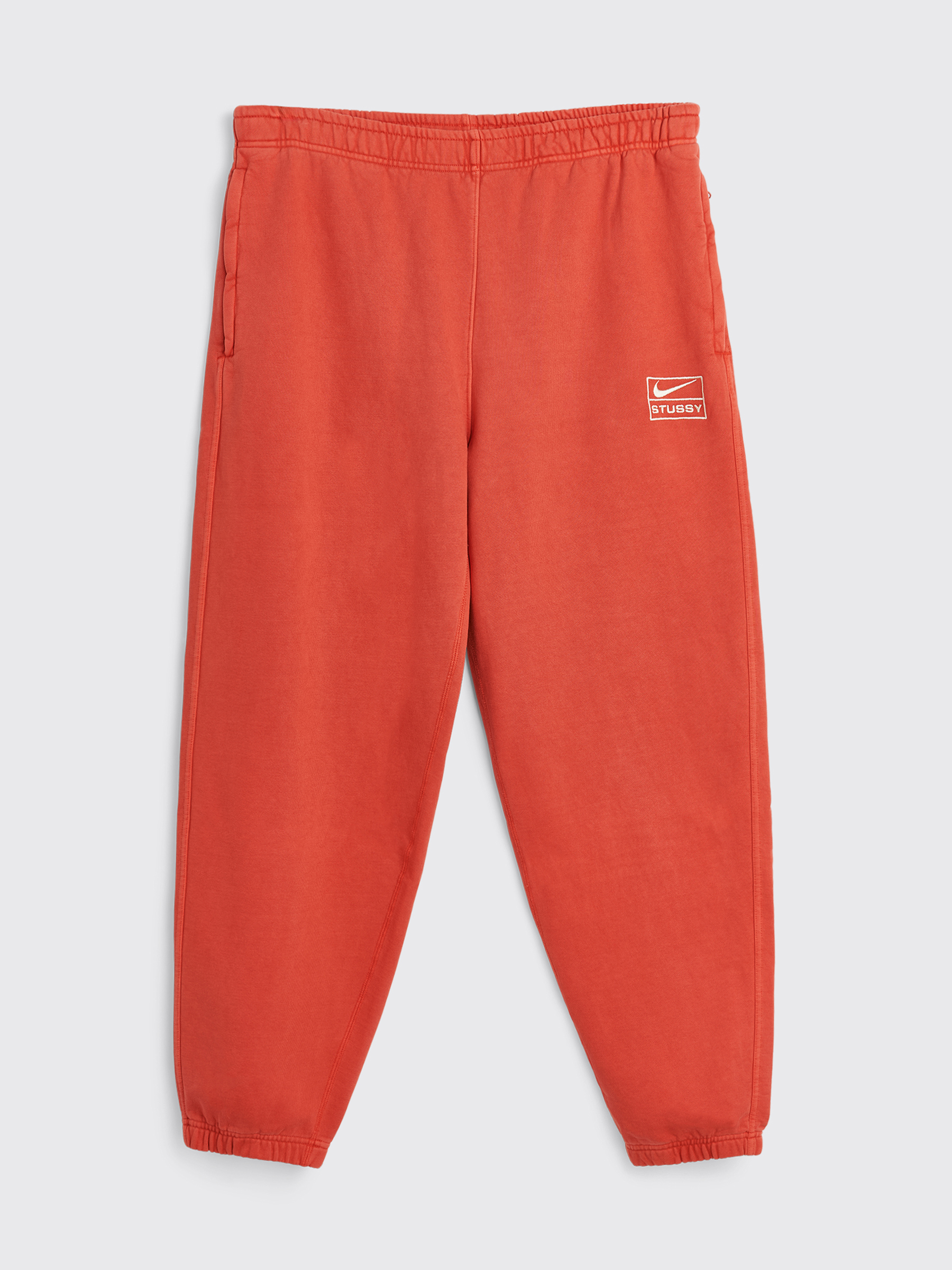 Nike x Stüssy Pigment Dyed Fleece Pants Habanero Red / Natural